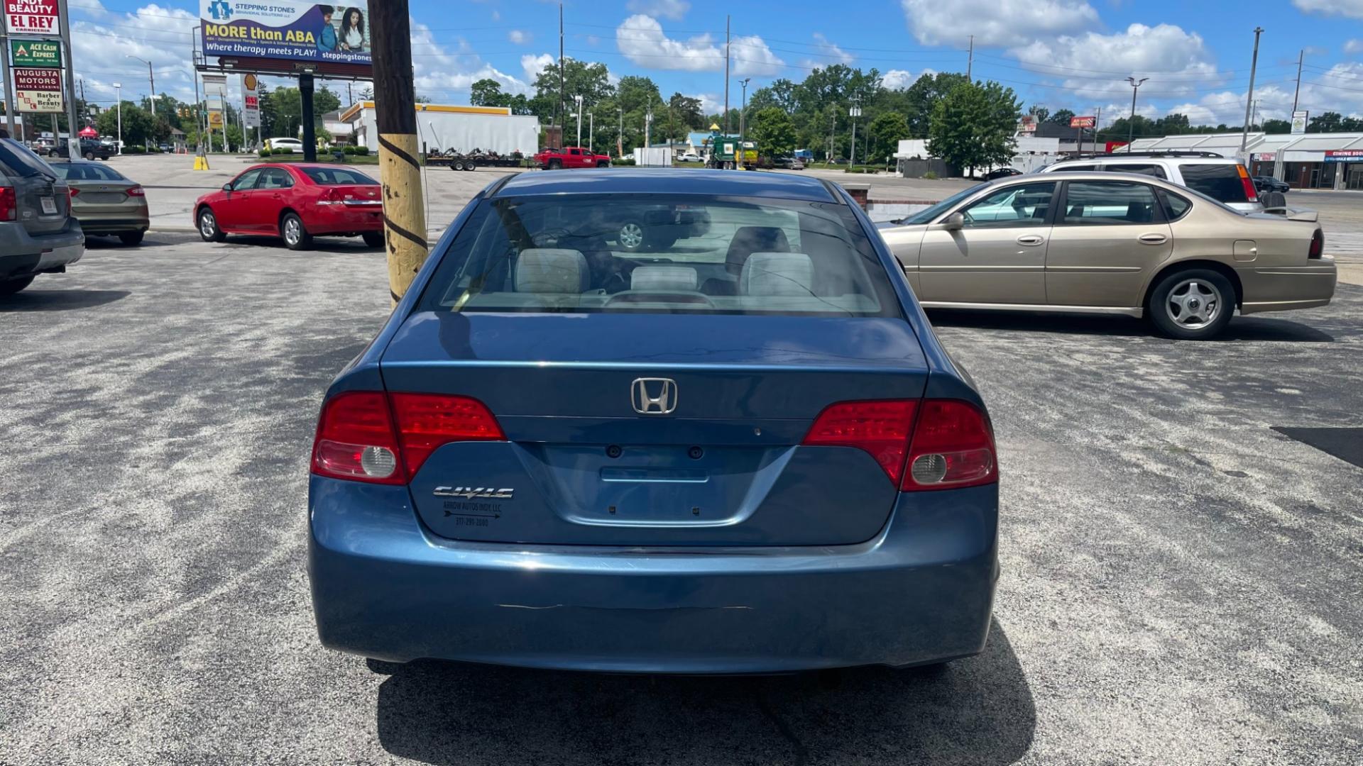 2006 BLUE Honda Civic EX Sedan (1HGFA158X6L) with an 1.8L L4 SOHC 16V engine, 5-Speed Manual transmission, located at 2710A Westlane Rd., Indianapolis, IN, 46268, (317) 291-2000, 39.885670, -86.208160 - Photo#1